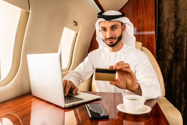 Best bank account for small business in UAE – Business owner depositing a check